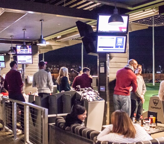 People at Top Golf