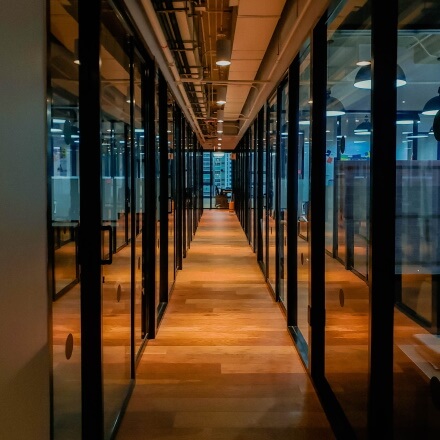 View of long office hallway