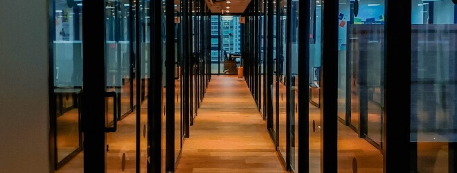 View of long office hallway